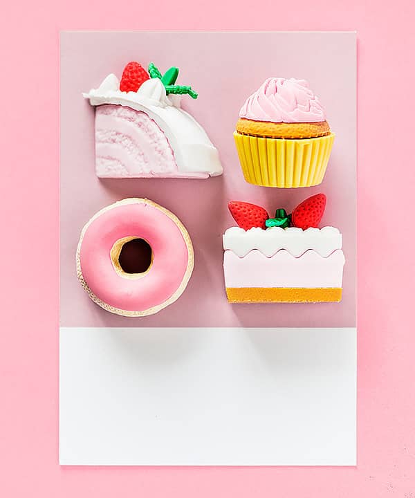 Pink desserts arranged on a pink card